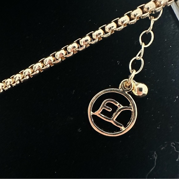 Erica Lyons shiny, gold toned, Infinity design bib necklace, statement piece. - Picture 9 of 10